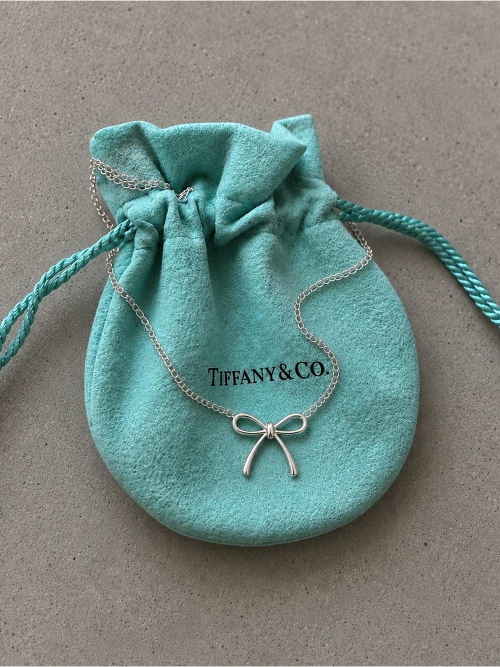 Tiffany & Co. Silver Bow Pendant Necklace with Tiffany Blue Pouch